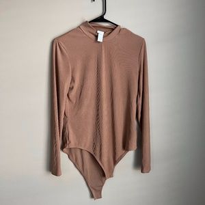 HM beige bodysuit